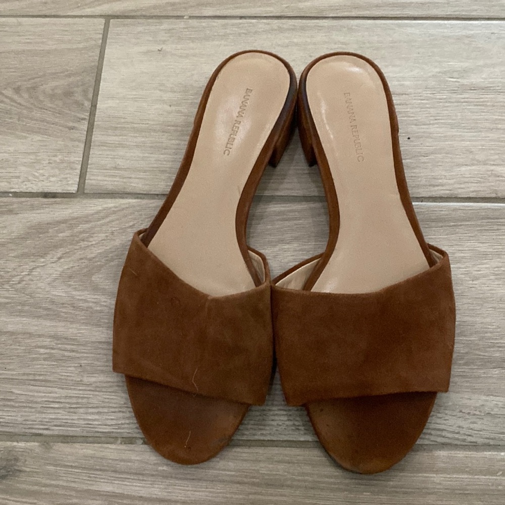 Brown suede slip ons